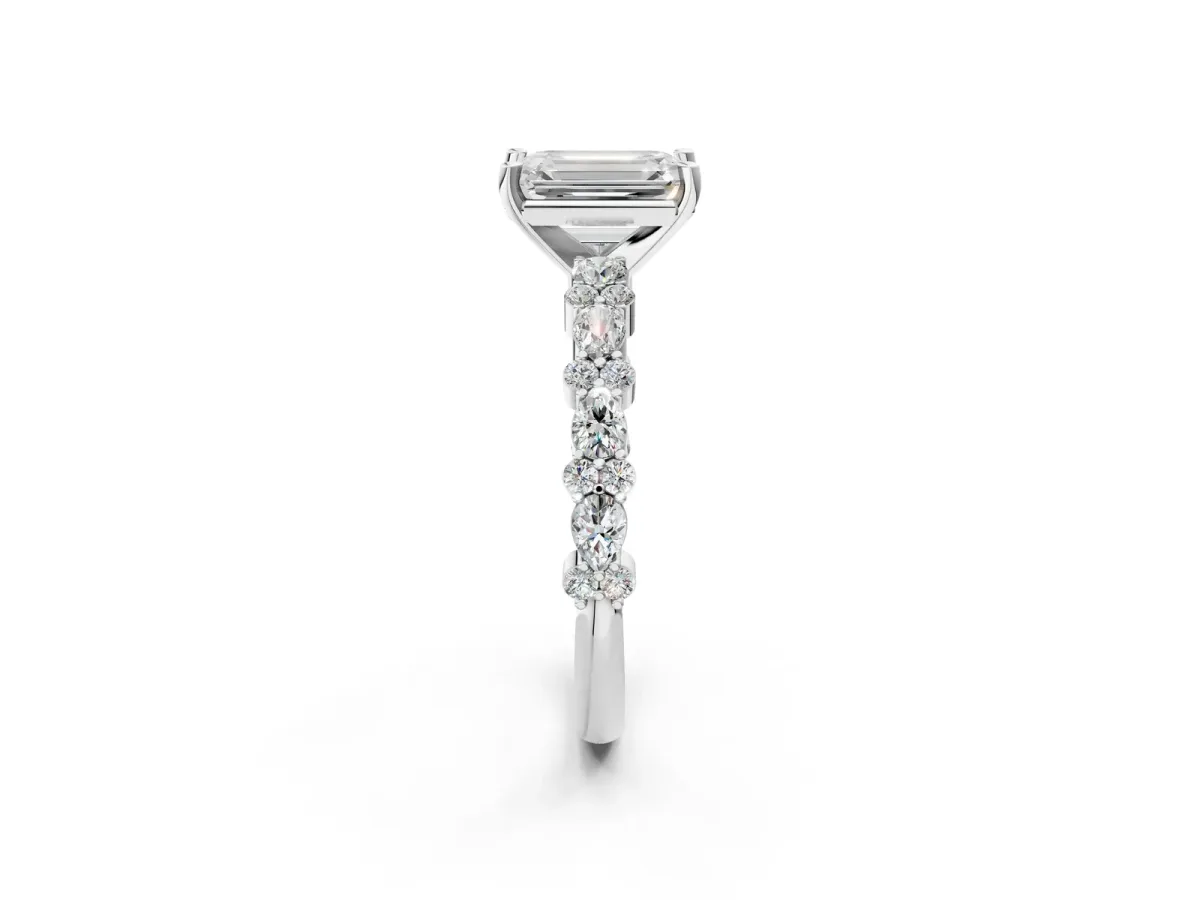Emerald Cut Diamond Side Stone Solitaire Ring with Round and Four-Prong Setting White gold