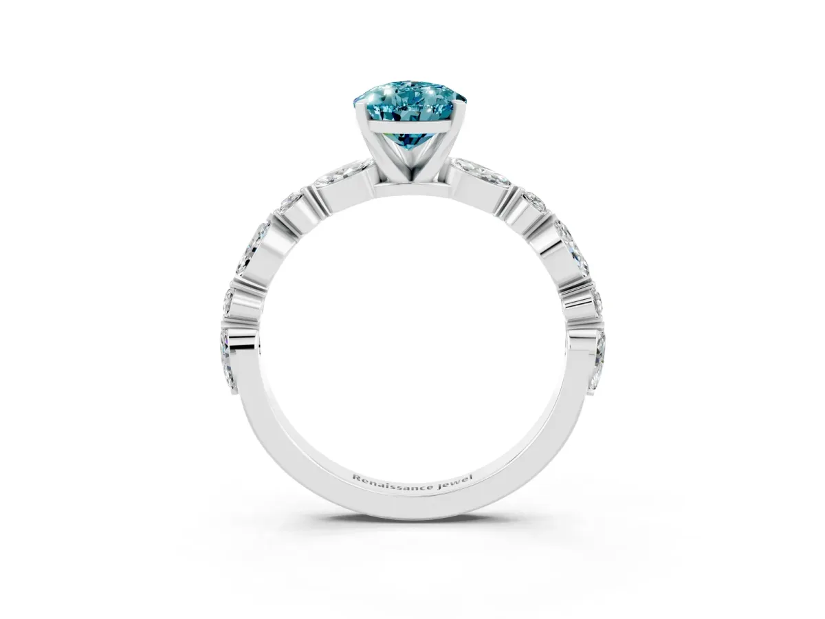Pear Cut Blue Topaz Ring with Marquise and Round Side Stones and Four-Prong Setting Platinum