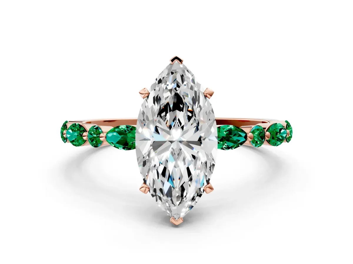 Marquise Cut Diamond Ring with Marquise and Round Emerald Side Stones and Four-Prong Setting Rose gold
