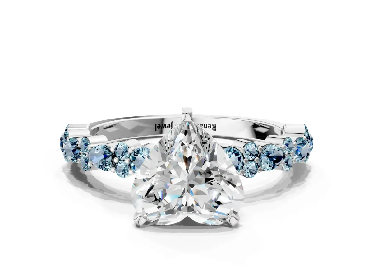 Heart Cut Diamond Side Stone Solitaire Ring with Round Aquamarine and Four-Prong Setting Platinum