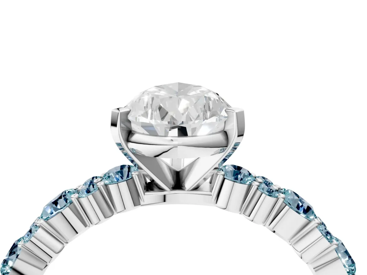 Pear Cut Diamond Side Stone Solitaire Ring with Round Aquamarine and Four-Prong Setting White gold