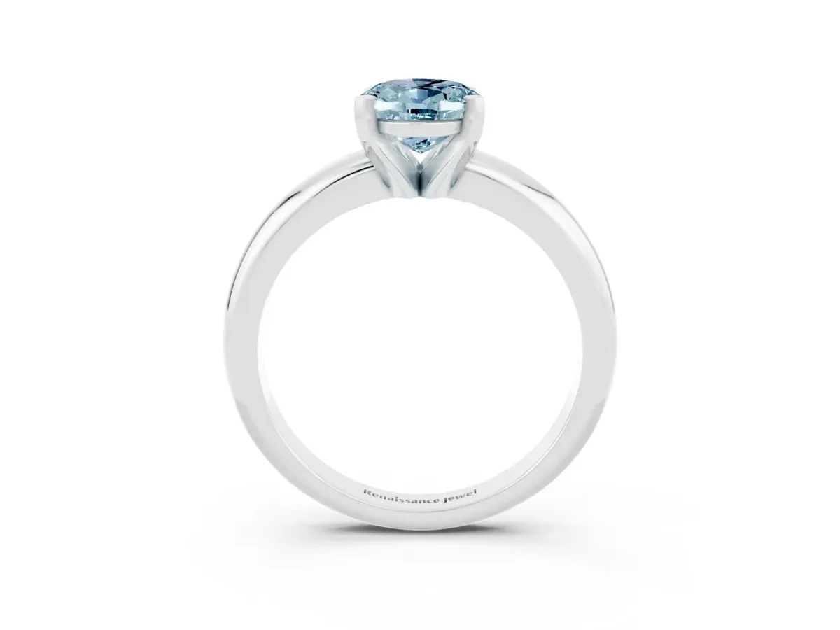 Oval Cut Aquamarine Solitaire Engagement Ring with Round Band and Four-Prong Setting Platinum