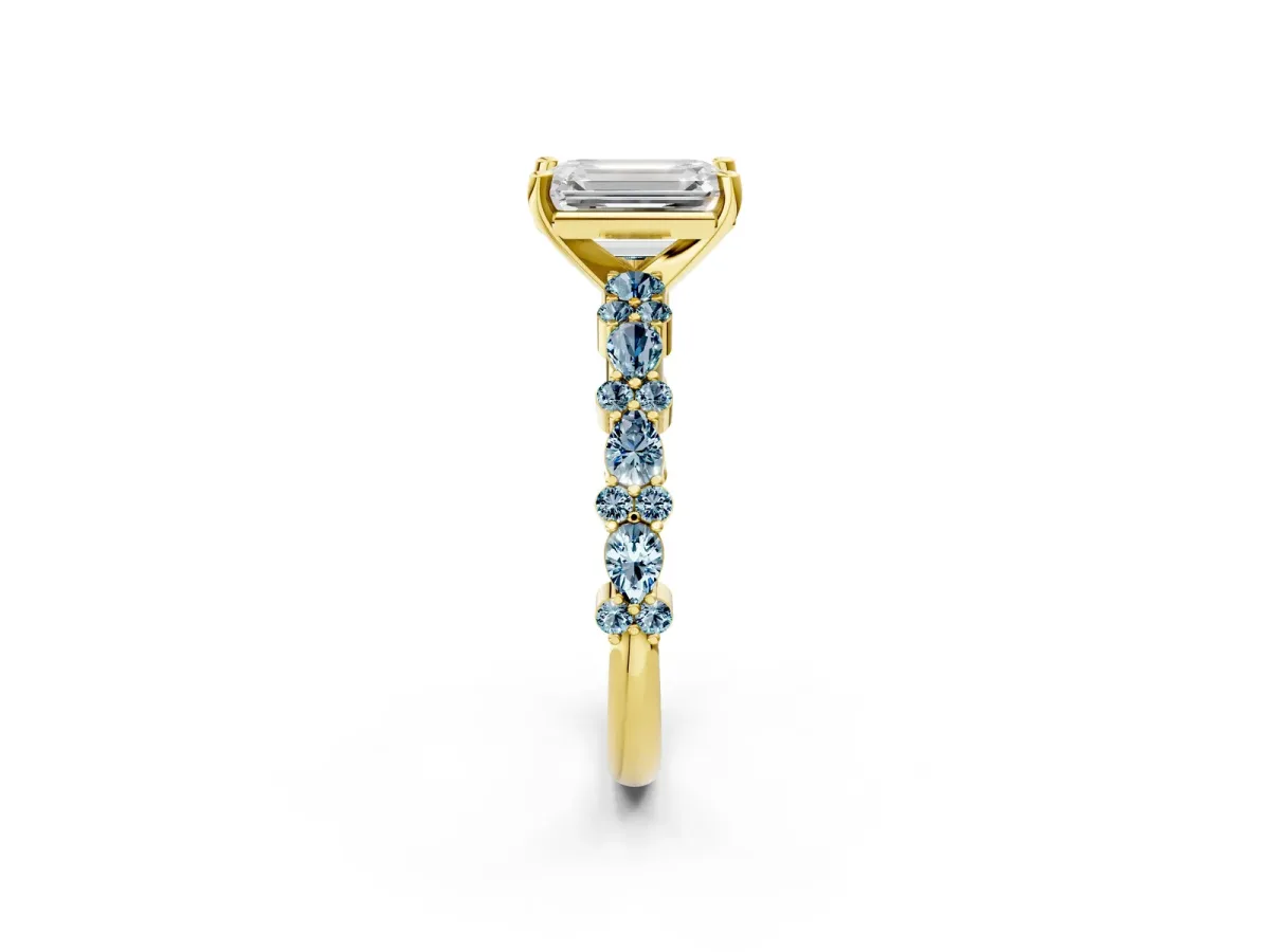 Emerald Cut Diamond Side Stone Solitaire Ring with Round Aquamarine and Four-Prong Setting Yellow gold