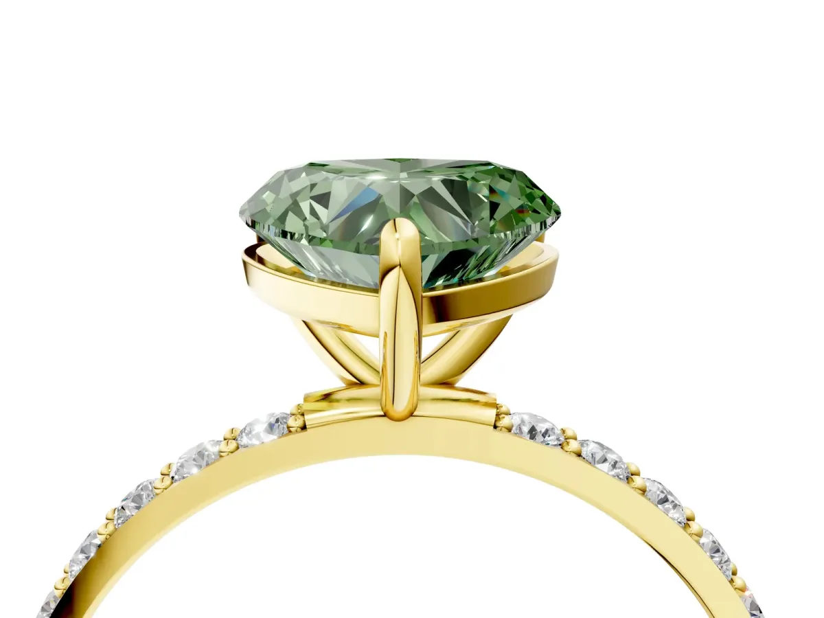 Fancy Green Heart Cut Diamond Solitaire Ring with Round Pavé Band and Prong Setting Yellow gold