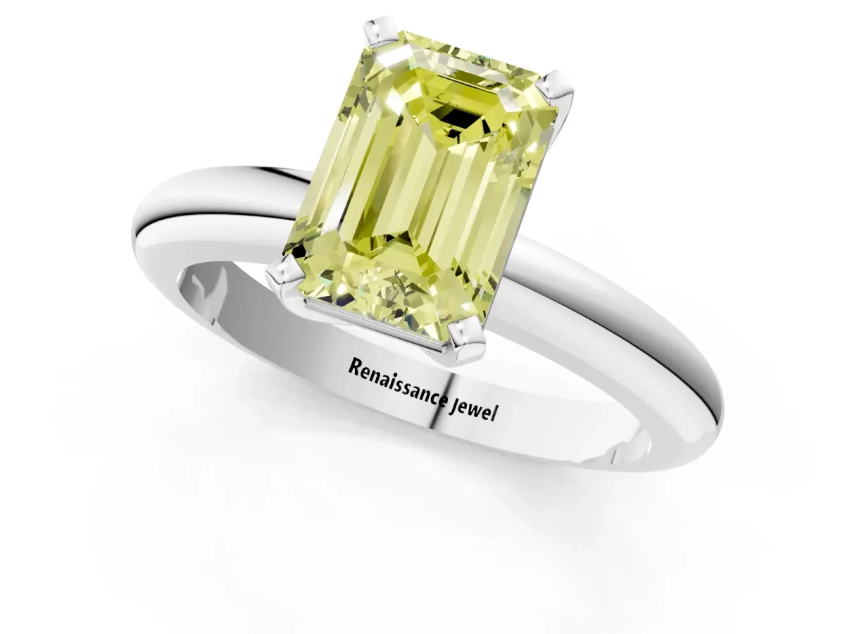 Fancy Yellow Emerald Cut Diamond Solitaire Engagement Ring with Round Band and Four-Prong Setting White gold
