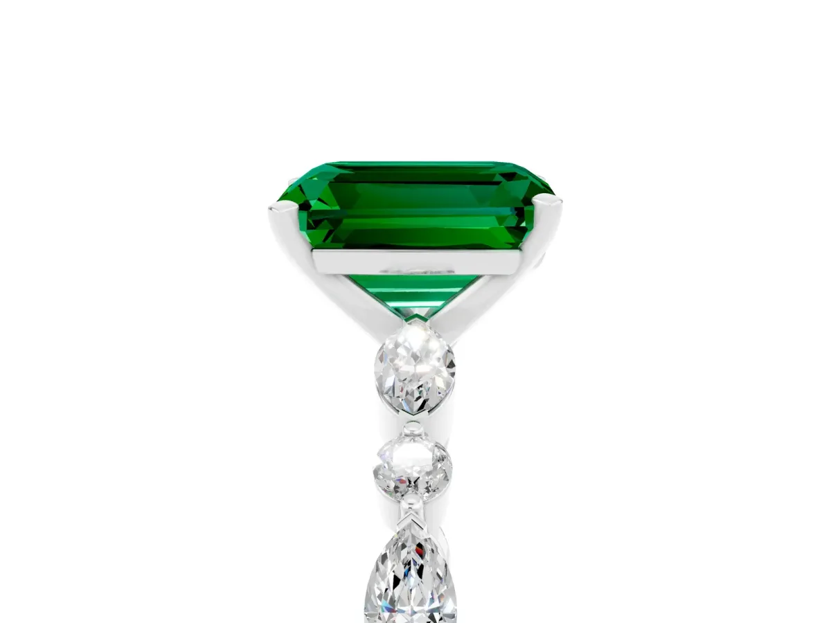 Emerald Cut Emerald Ring with Marquise and Round Side Stones and Four-Prong Setting Platinum