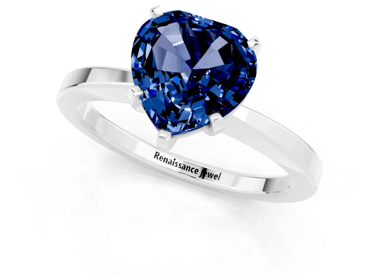 Heart Cut Blue Sapphire Solitaire Engagement Ring with Classic Band and Four-Prong Setting Silver