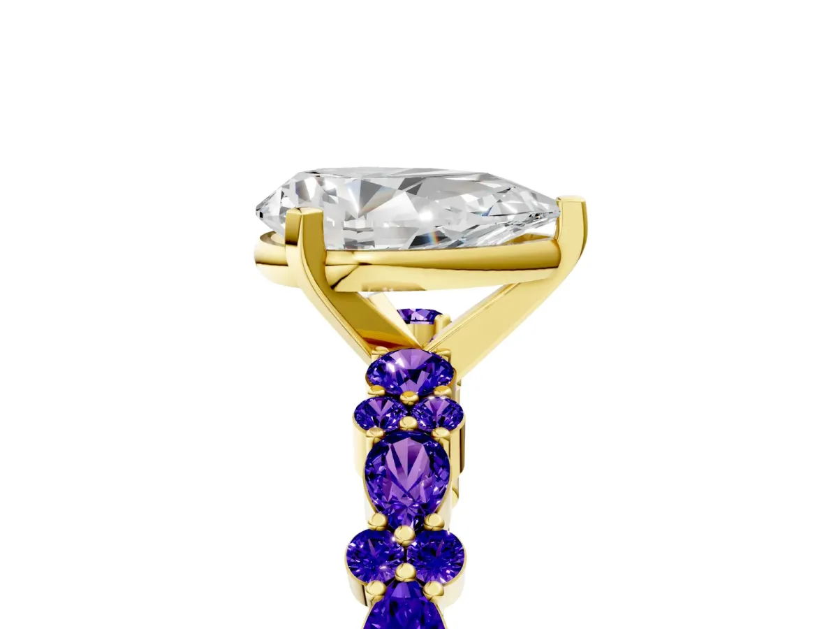 Pear Cut Diamond Side Stone Solitaire Ring with Round Tanzanite and Four-Prong Setting Yellow gold