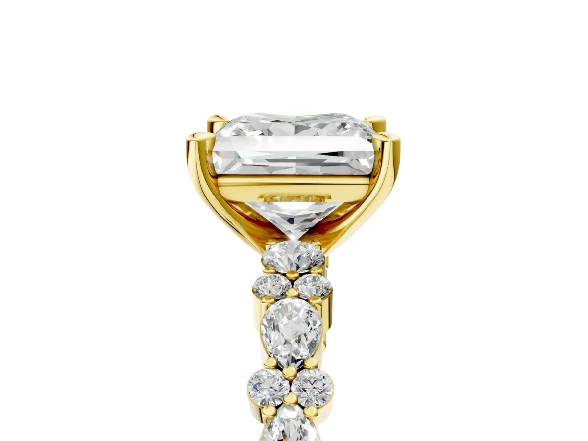 Princess Cut Diamond Side Stone Solitaire Ring with Round and Four-Prong Setting Yellow gold