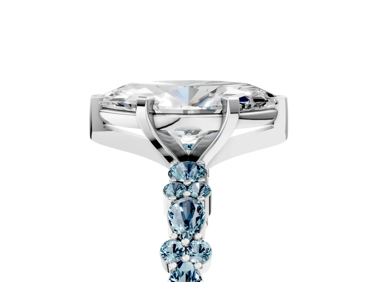 Marquise Cut Diamond Side Stone Solitaire Ring with Round Aquamarine and Four-Prong Setting Platinum