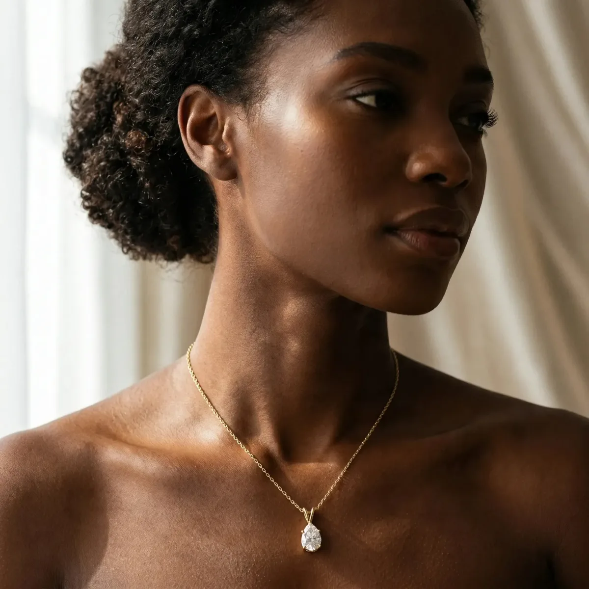 Pear Cut Solitaire Pendant with Three-Prong Setting Yellow gold