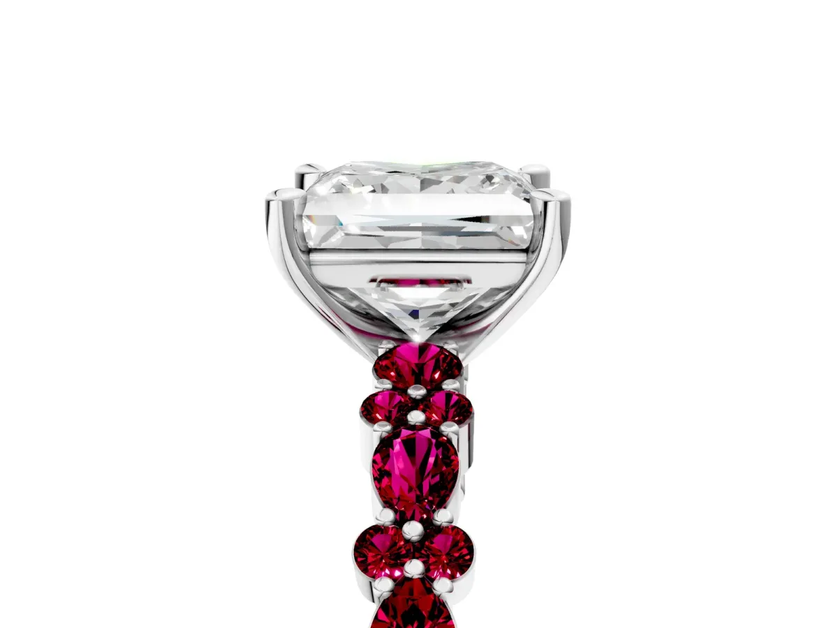 Princess Cut Diamond Side Stone Solitaire Ring with Round Garnet and Four-Prong Setting Platinum