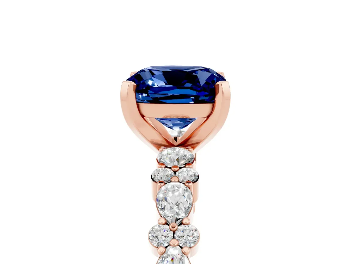 Cushion Cut Blue Sapphire Side Stone Solitaire Ring with Round and Four-Prong Setting Rose gold