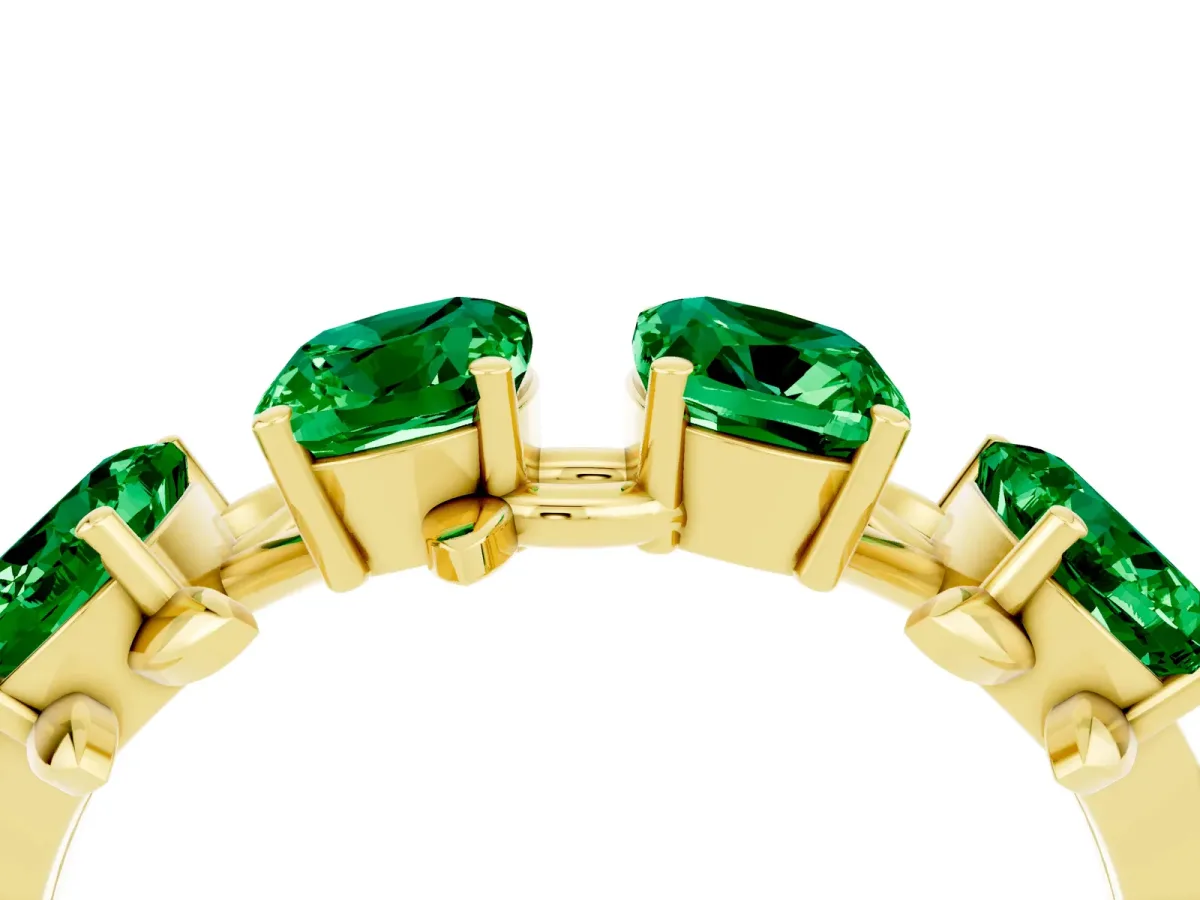 Four-Stone Elongated Cushion Emerald Band with Nature-Inspired Prong Setting Yellow gold