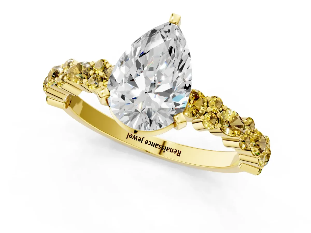 Pear Cut Diamond Side Stone Solitaire Ring with Round Yellow Sapphire and Four-Prong Setting Yellow gold