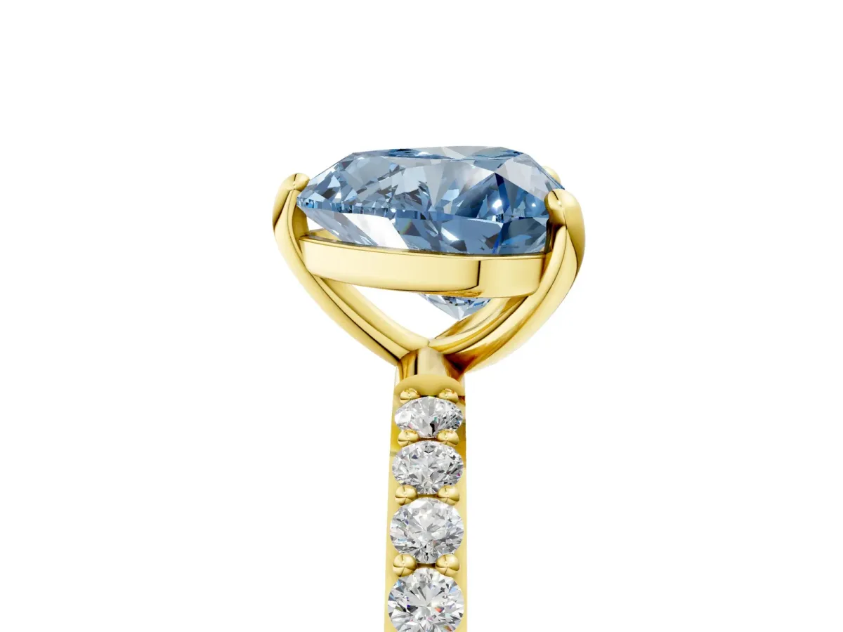 Fancy Blue Heart Cut Diamond Solitaire Ring with Round Pavé Band and Prong Setting Yellow gold