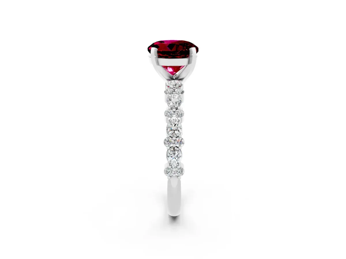 Round Cut Garnet Side Stone Solitaire Ring with Round and Four-Prong Setting Silver