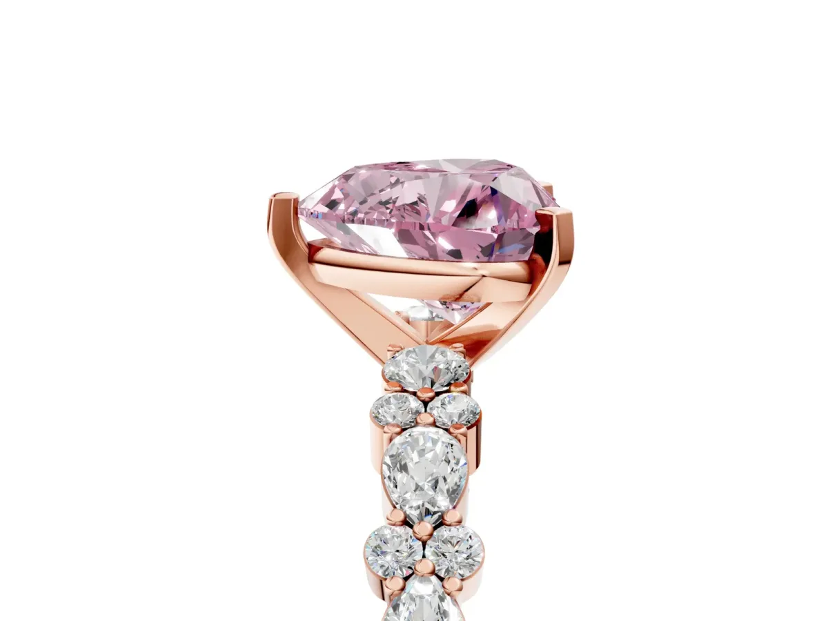 Fancy Pink Heart Cut Diamond Side Stone Solitaire Ring with Round and Four-Prong Setting Rose gold