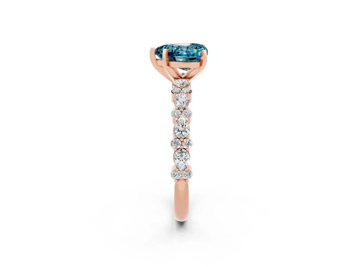 Heart Cut Blue Topaz Side Stone Solitaire Ring with Round and Four-Prong Setting Rose gold