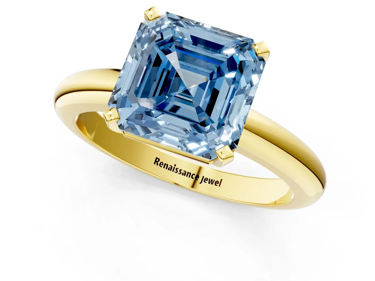 Fancy Blue Asscher Cut Diamond Solitaire Engagement Ring with Round Band and Four-Prong Setting Yellow gold