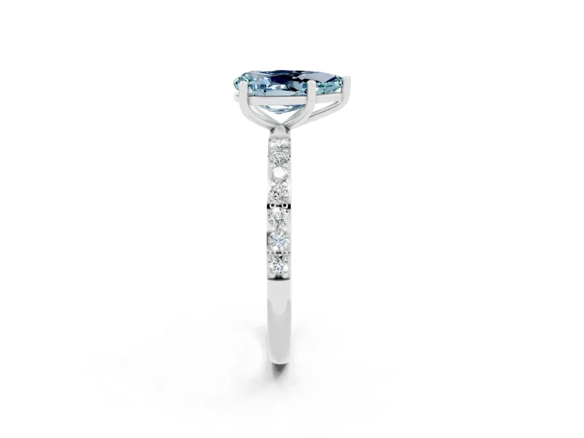 Pear Cut Aquamarine Solitaire Ring with Round Pavé Band and Prong Setting Silver