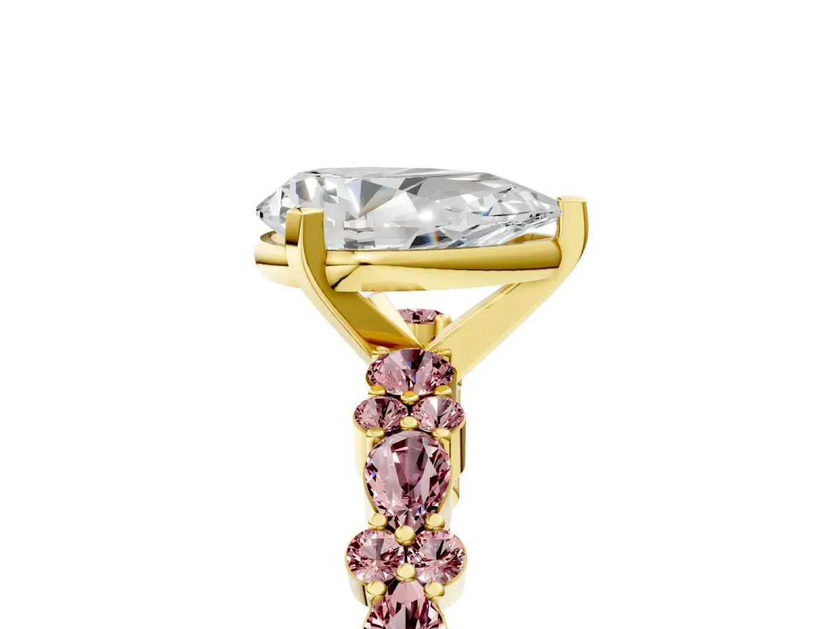 Pear Cut Diamond Side Stone Solitaire Ring with Round Morganite and Four-Prong Setting Yellow gold