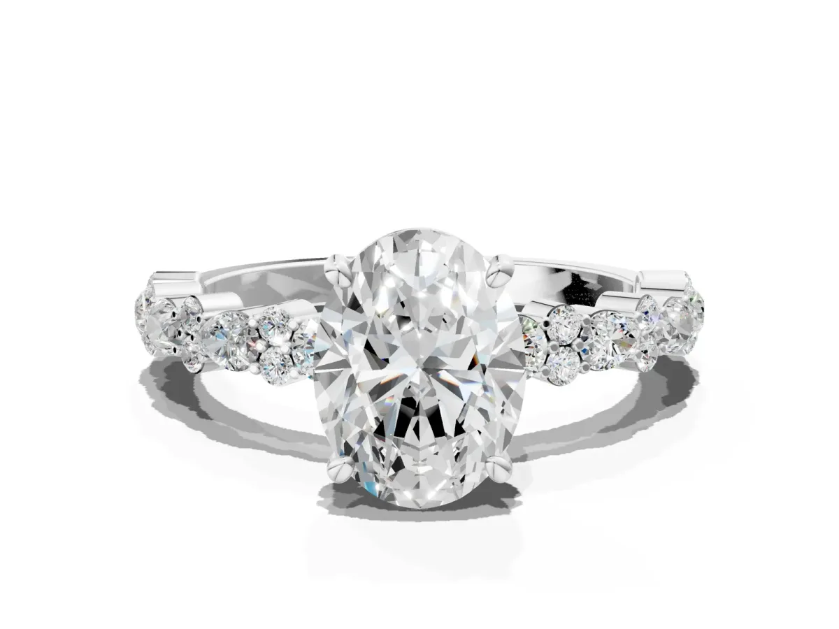 Oval Cut Diamond Side Stone Solitaire Ring with Round and Four-Prong Setting Platinum