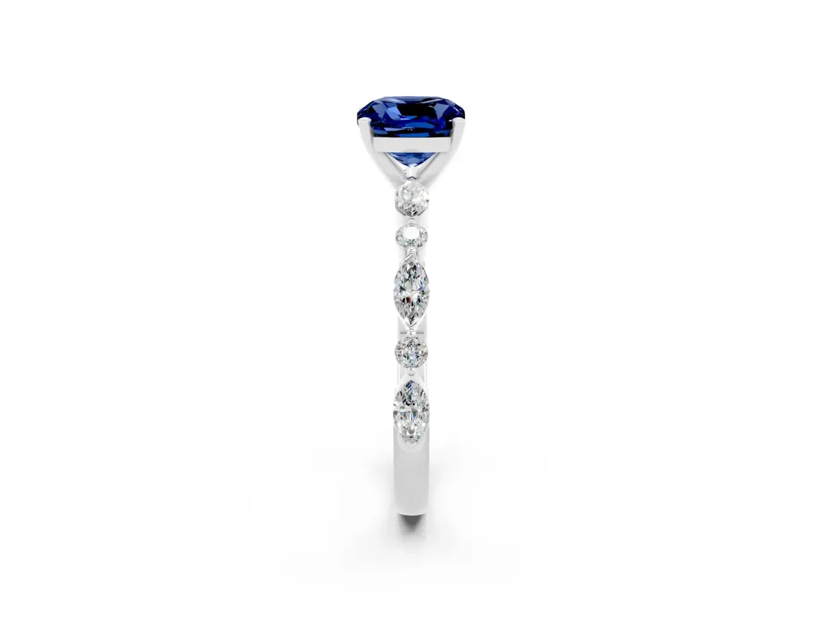 Cushion Cut Blue Sapphire Ring with Marquise and Round Side Stones and Four-Prong Setting Silver