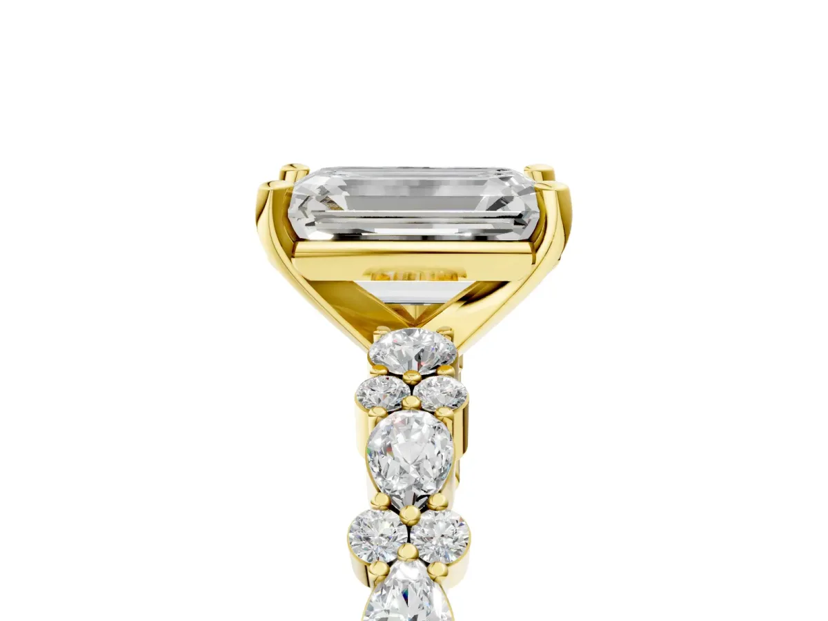 Emerald Cut Diamond Side Stone Solitaire Ring with Round Moissanite and Four-Prong Setting Yellow gold
