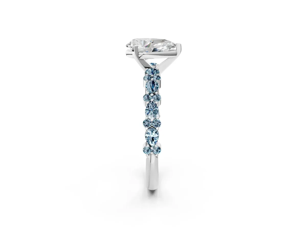 Pear Cut Diamond Side Stone Solitaire Ring with Round Aquamarine and Four-Prong Setting White gold
