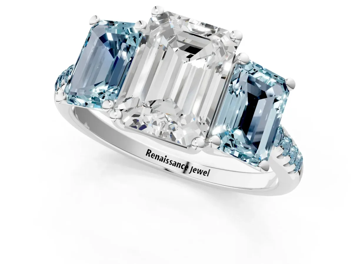 Three-Stone Emerald Cut Diamond Ring with Round Aquamarine Pavé Band and Prong Setting Platinum