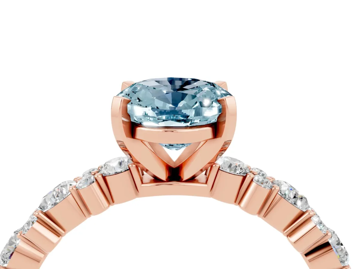 Oval Cut Aquamarine Side Stone Solitaire Ring with Round and Four-Prong Setting Rose gold