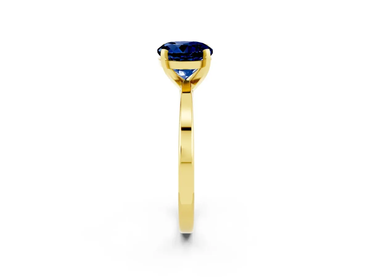 Round Cut Blue Sapphire Solitaire Engagement Ring with Classic Band and Four-Prong Setting Yellow gold