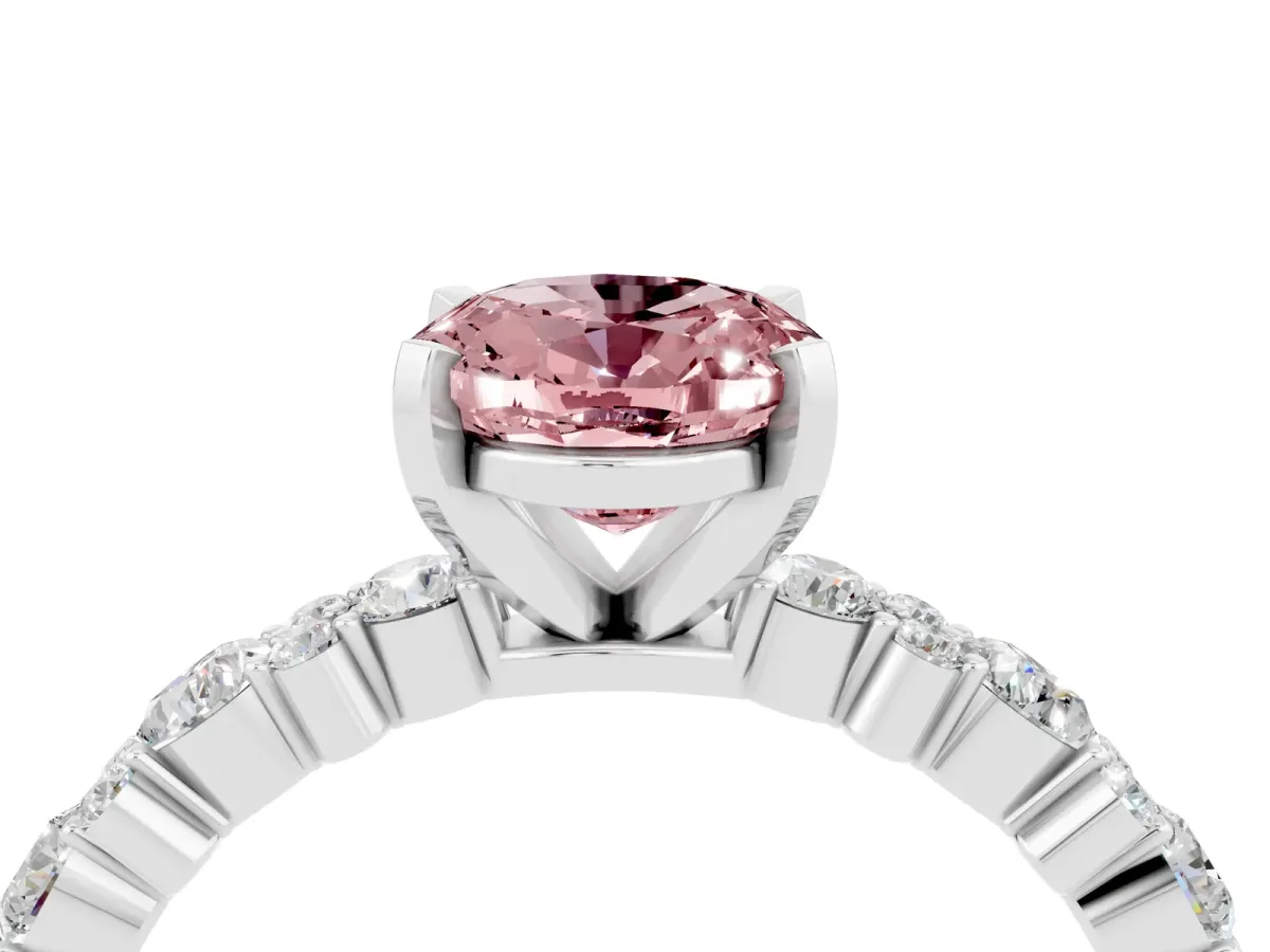 Oval Cut Morganite Side Stone Solitaire Ring with Round and Four-Prong Setting Silver