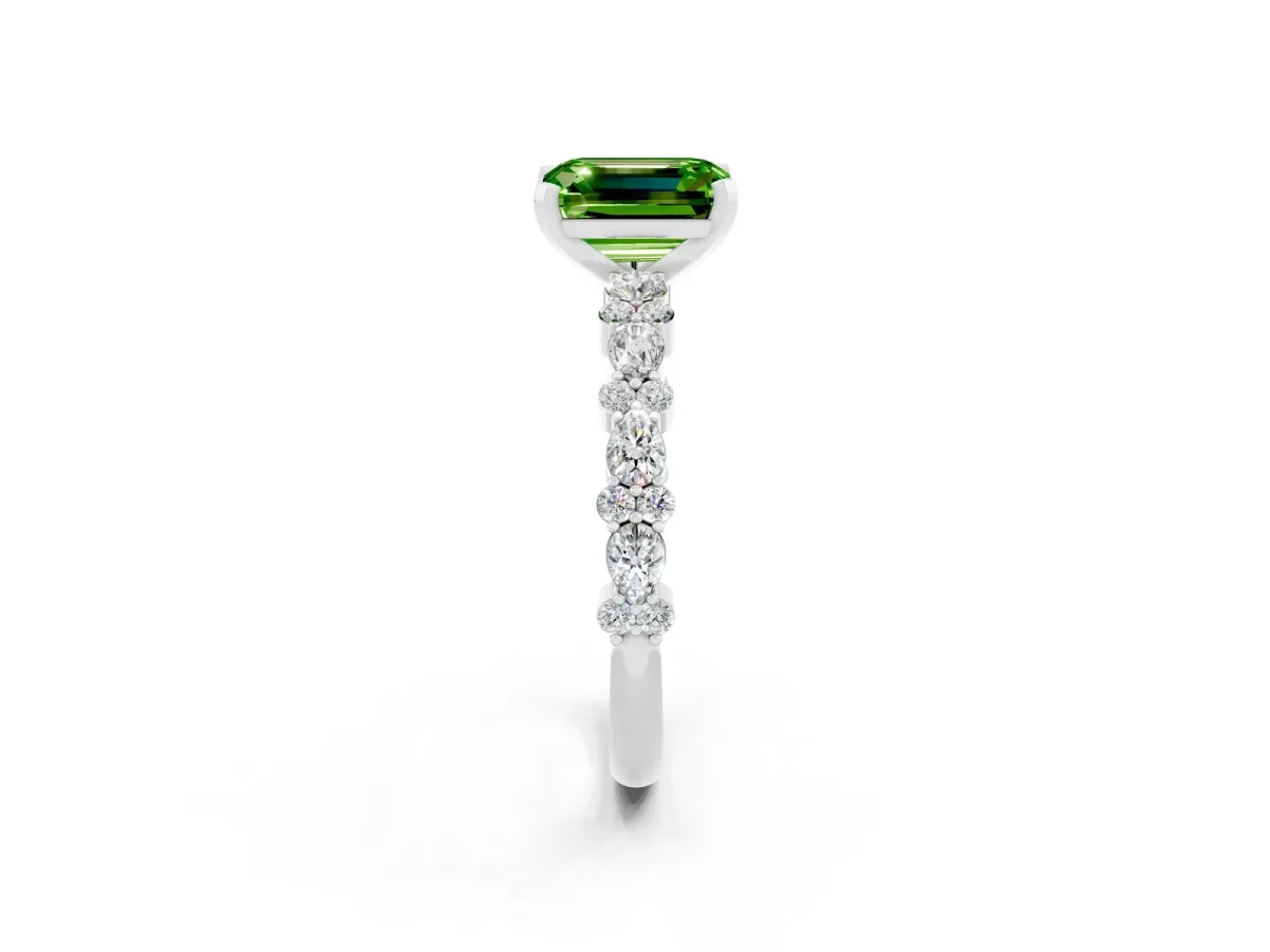 Emerald Cut Peridot Side Stone Solitaire Ring with Round and Four-Prong Setting White gold