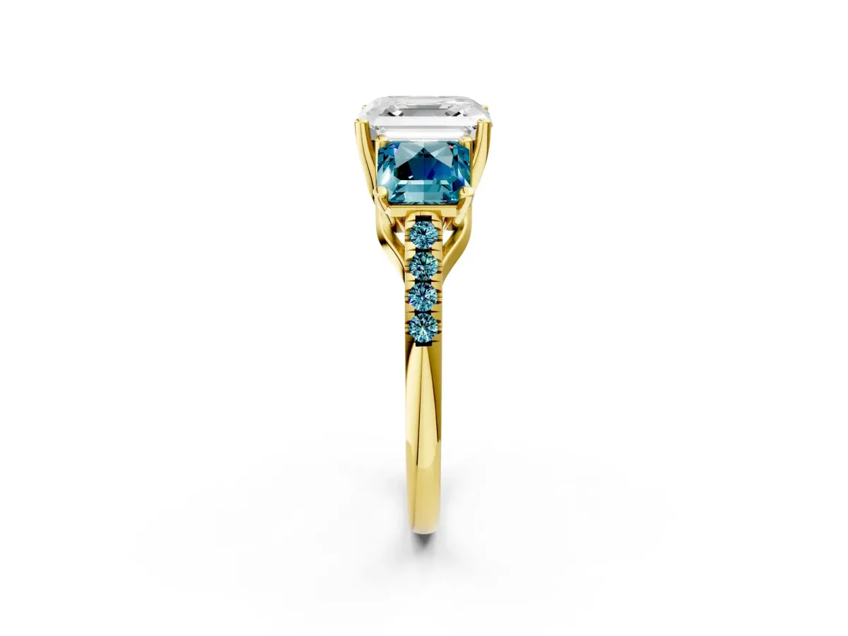 Three-Stone Asscher Cut Diamond Ring with Round Blue Topaz Pavé Band and Prong Setting Yellow gold