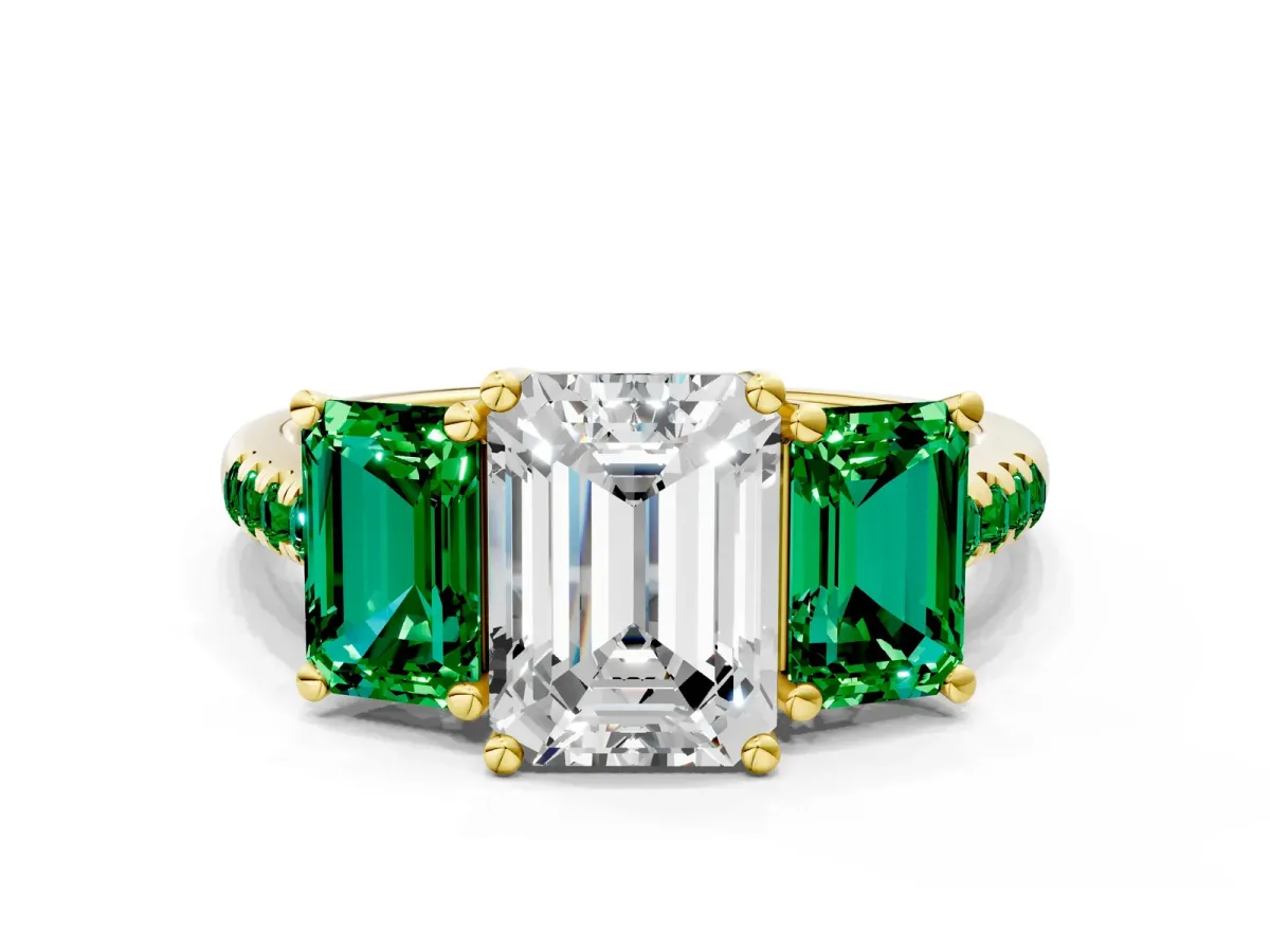 Three-Stone Emerald Cut Diamond Ring with Round Emerald Pavé Band and Prong Setting Yellow gold