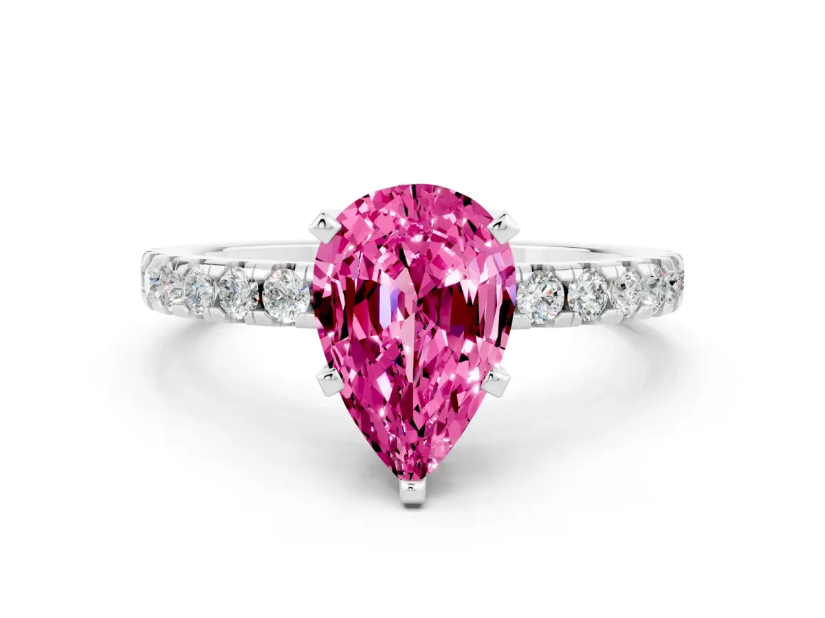 Pear Cut Pink Sapphire Solitaire Ring with Round Pavé Band and Four-Prong Setting Silver