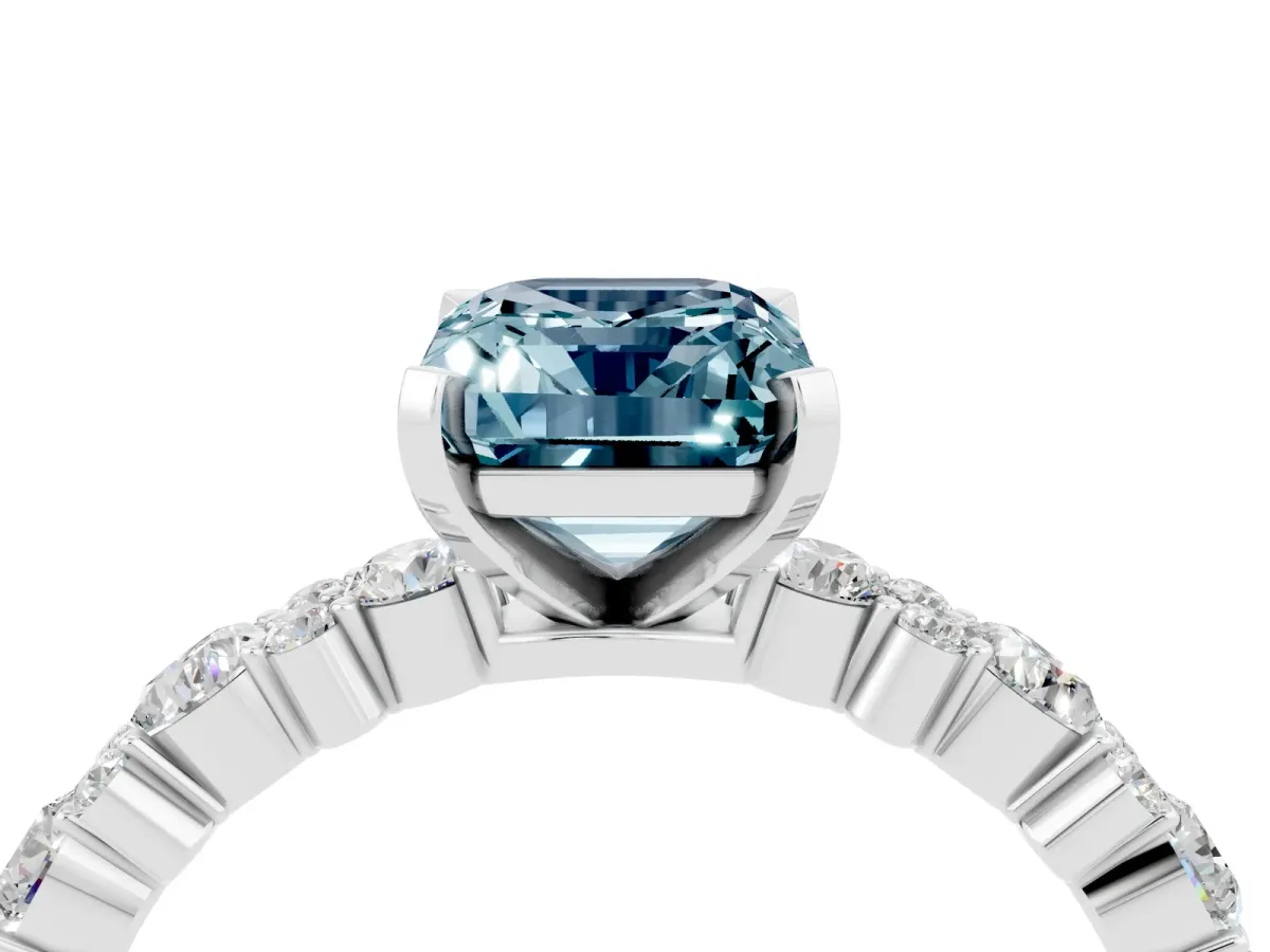Emerald Cut Aquamarine Side Stone Solitaire Ring with Round and Four-Prong Setting White gold