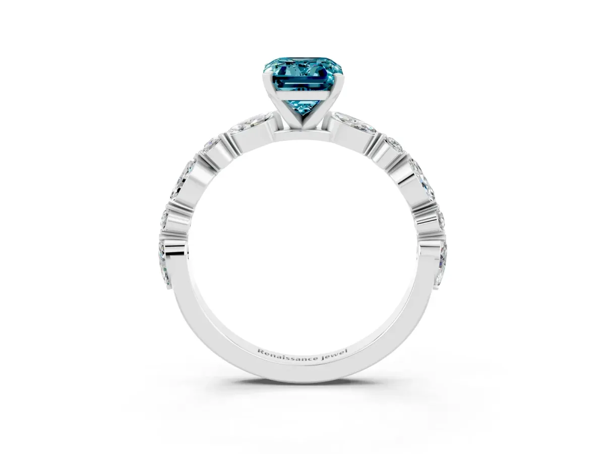 Emerald Cut Blue Topaz Ring with Marquise and Round Side Stones and Four-Prong Setting Silver