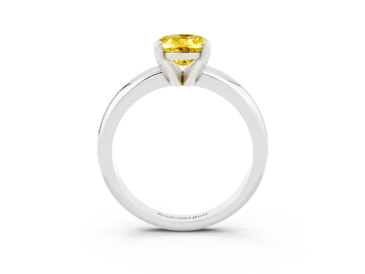 Oval Cut Yellow Sapphire Solitaire Engagement Ring with Round Band and Four-Prong Setting Silver