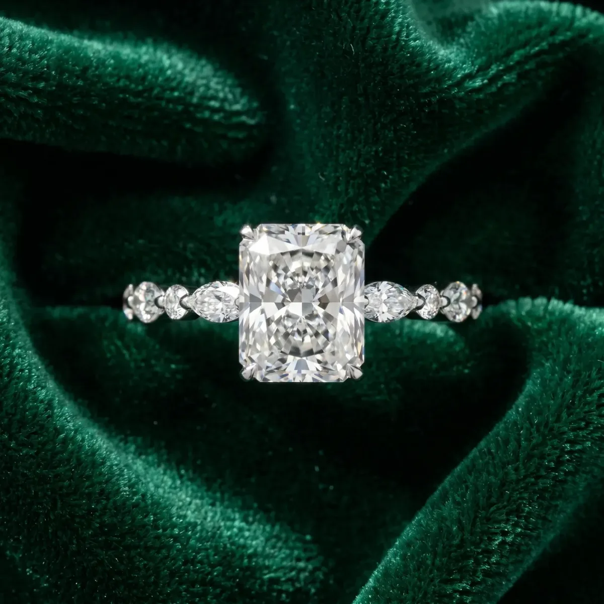 Radiant Cut Diamond Ring with Marquise and Round Side Stones and Four-Prong Setting Silver