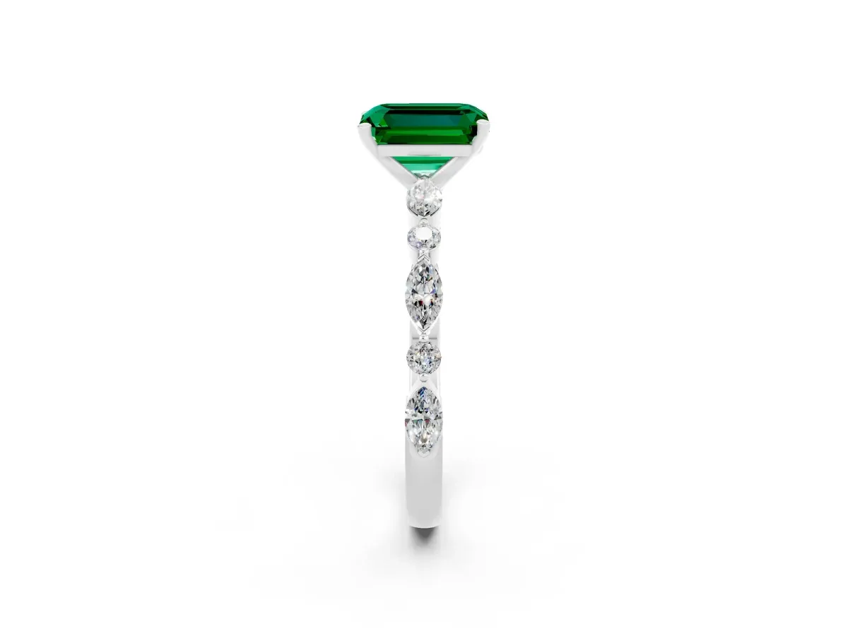 Emerald Cut Emerald Ring with Marquise and Round Side Stones and Four-Prong Setting Platinum