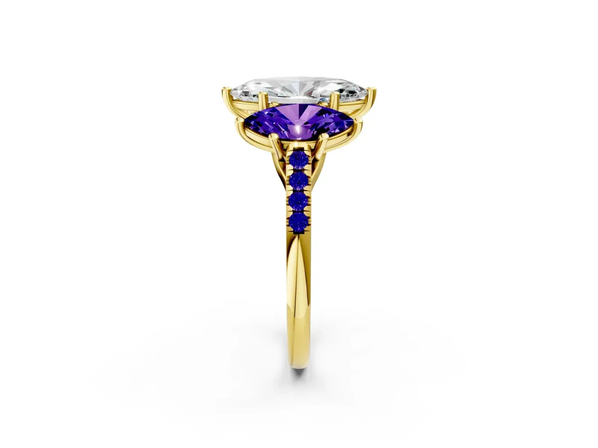 Three-Stone Marquise Cut Diamond Ring with Round Tanzanite Pavé Band and Prong Setting Yellow gold