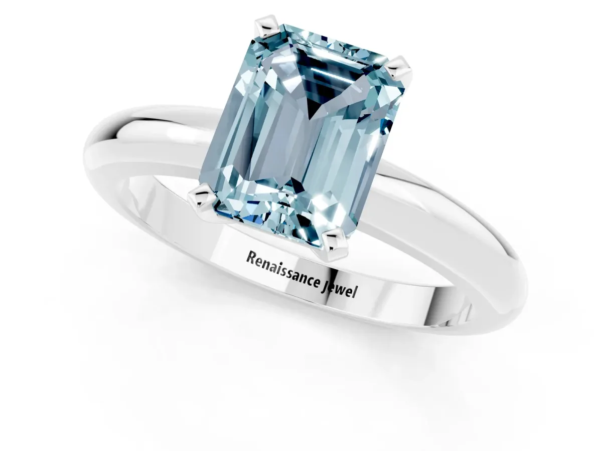 Emerald Cut Aquamarine Solitaire Engagement Ring with Round Band and Four-Prong Setting Platinum