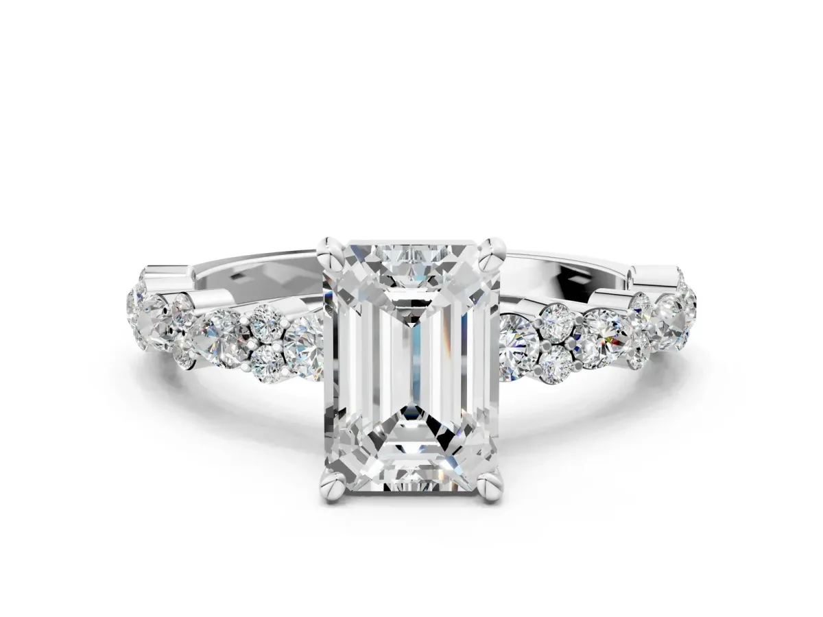 Emerald Cut Diamond Side Stone Solitaire Ring with Round and Four-Prong Setting White gold