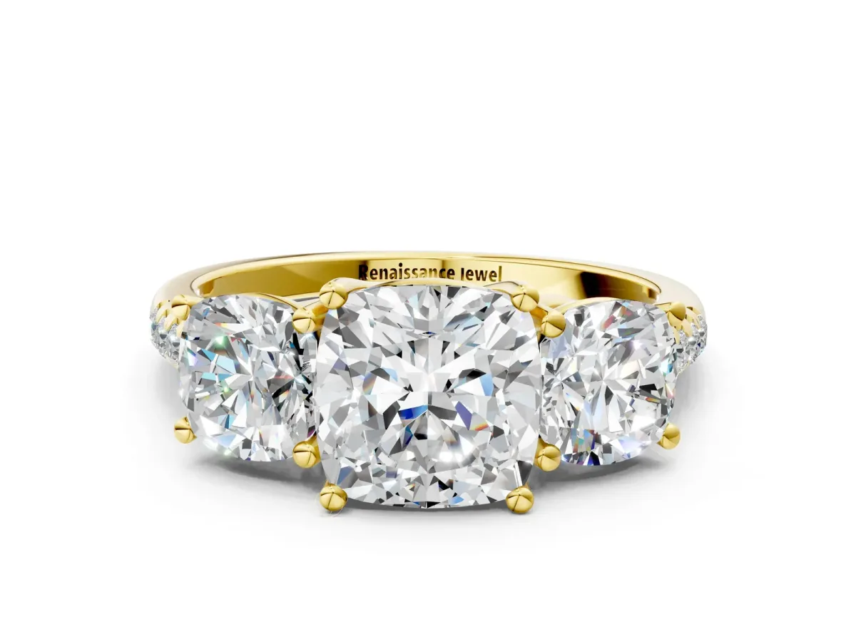 Fancy Black Three-Stone Cushion Cut Diamond Ring with Round Pavé Band and Prong Setting Yellow gold