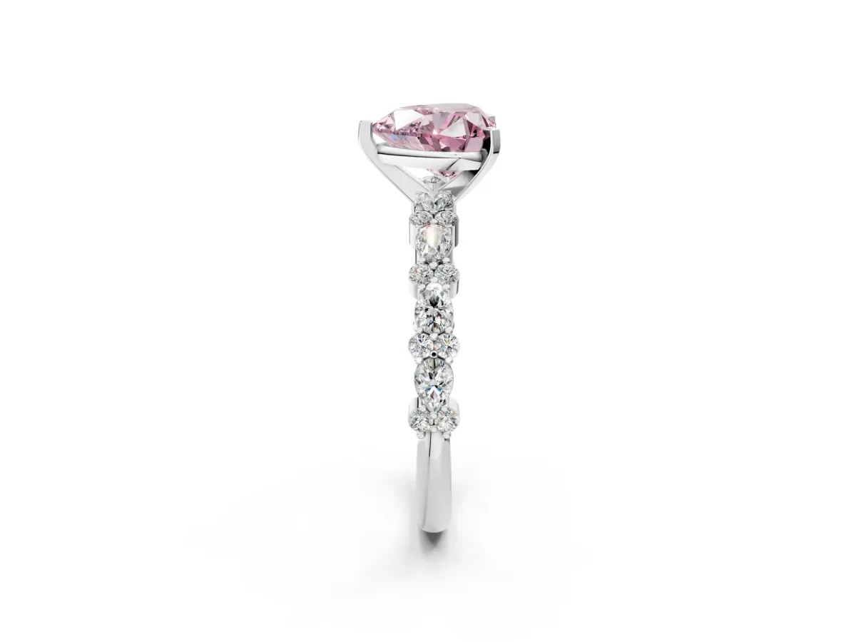 Fancy Pink Heart Cut Diamond Side Stone Solitaire Ring with Round and Four-Prong Setting White gold