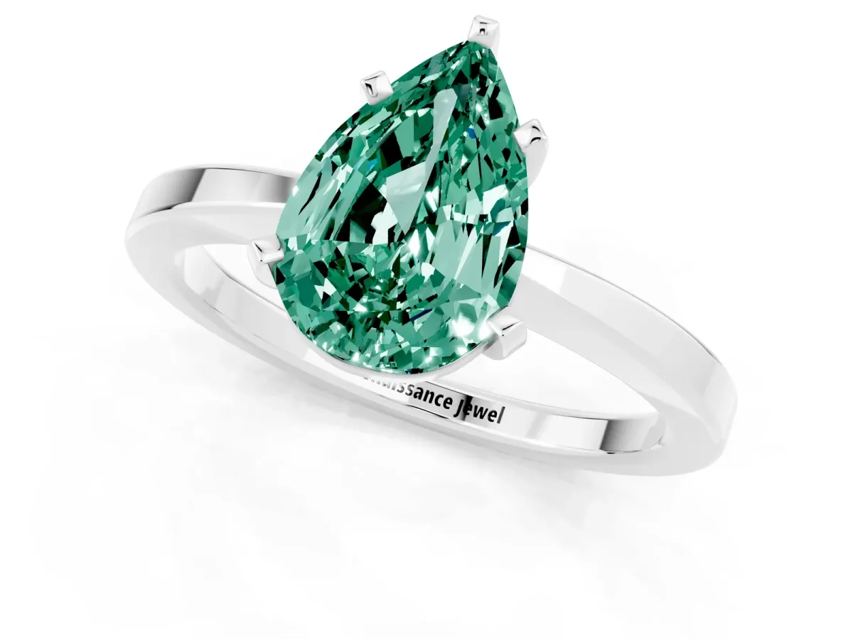 Pear Cut Green Sapphire Solitaire Engagement Ring with Classic Band and Four-Prong Setting Silver