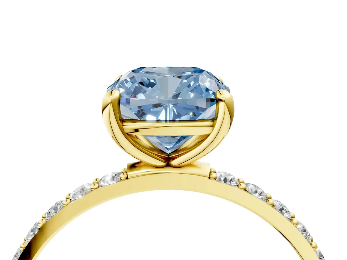 Fancy Blue Cushion Cut Diamond Solitaire Ring with Round Pavé Band and Prong Setting Yellow gold